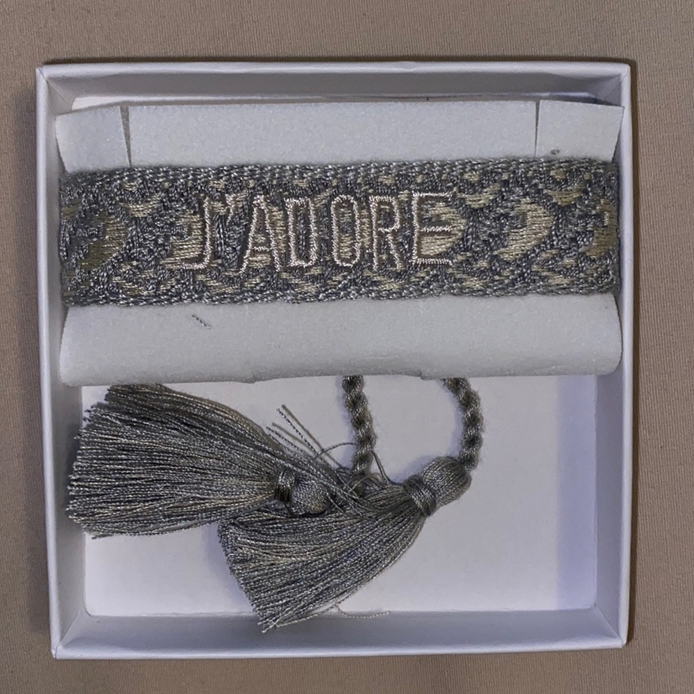 J’adore thread bracelet grey tassels